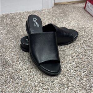 Worn only 1 time Stylish Black leather Slip-On Sandals by Seychelles